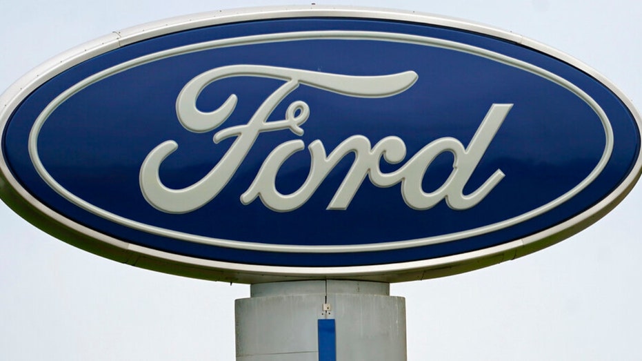 A Ford logo on a sign