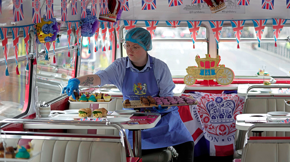 Tour Bus worker making tea