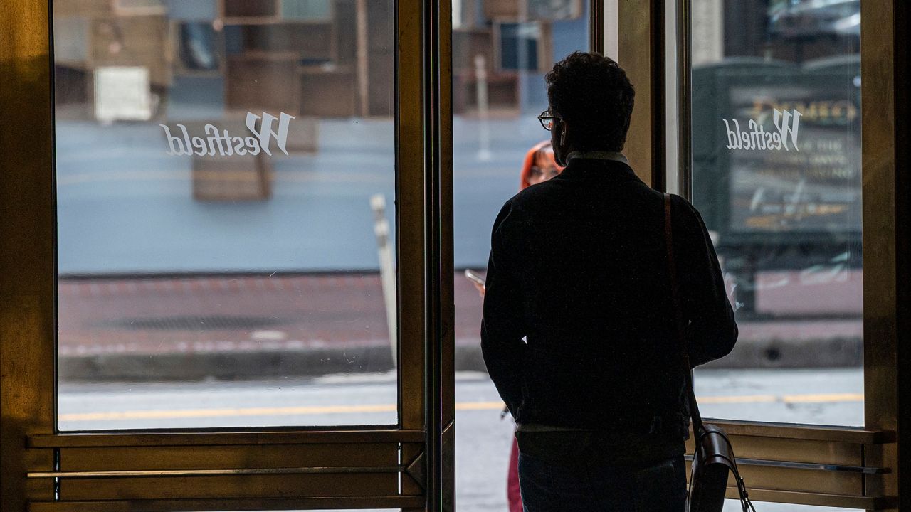 A shopper exits the Westfield San Francisco Centre shopping mall in San Francisco, California, US, on Tuesday, June 13, 2023. The owners of the mall are giving up the property to lenders, adding to deepening real estate pain in a city struggling to bring back workers and tourists after the pandemic. 